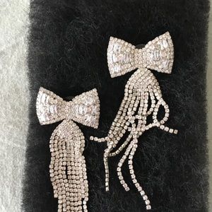 High end Bow glam special occasion stud earrings. Never worn, look amazing on!
